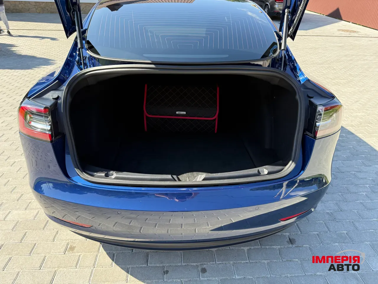 Tesla Model 3 - фото 10