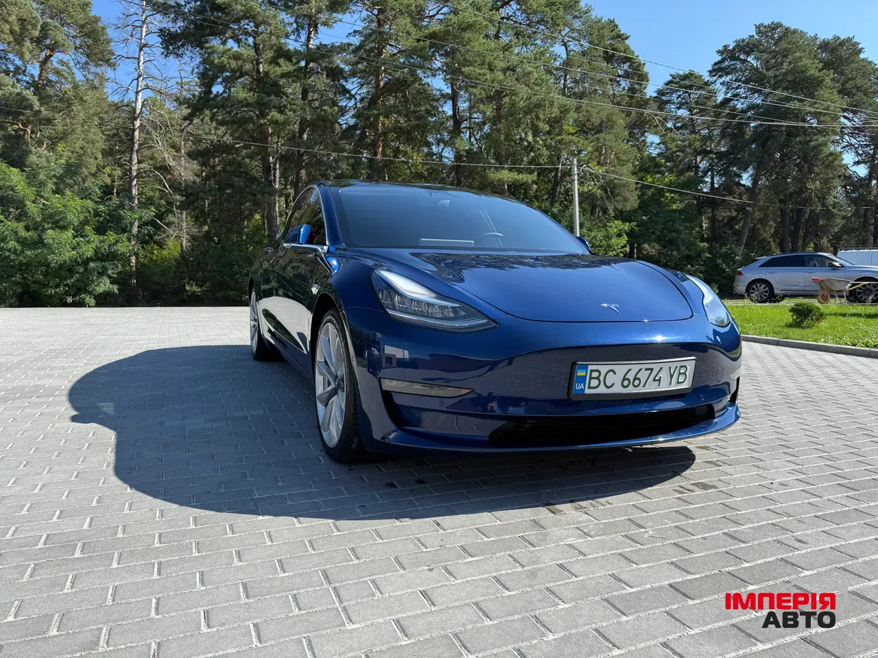 Tesla Model 3 - фото 1