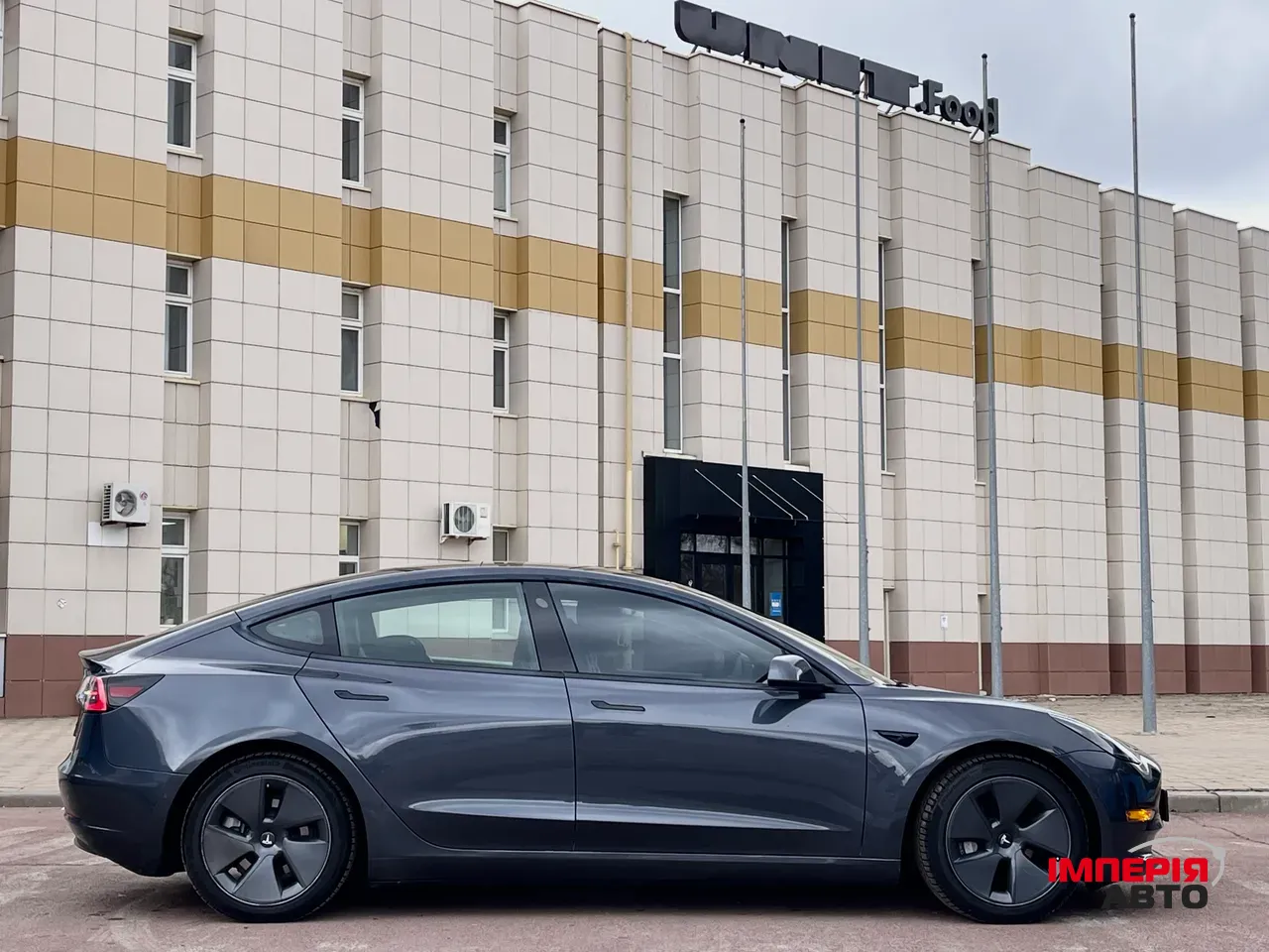 Tesla Model 3 - фото 11