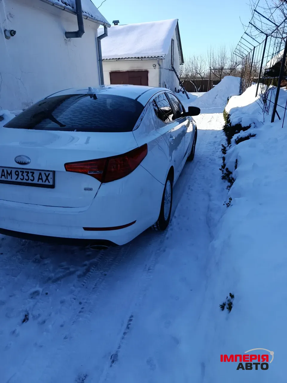 Kia Optima - фото 4