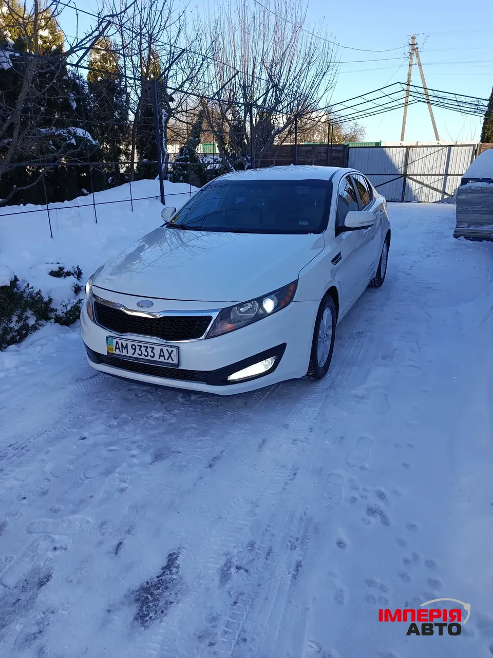Kia Optima - фото 1