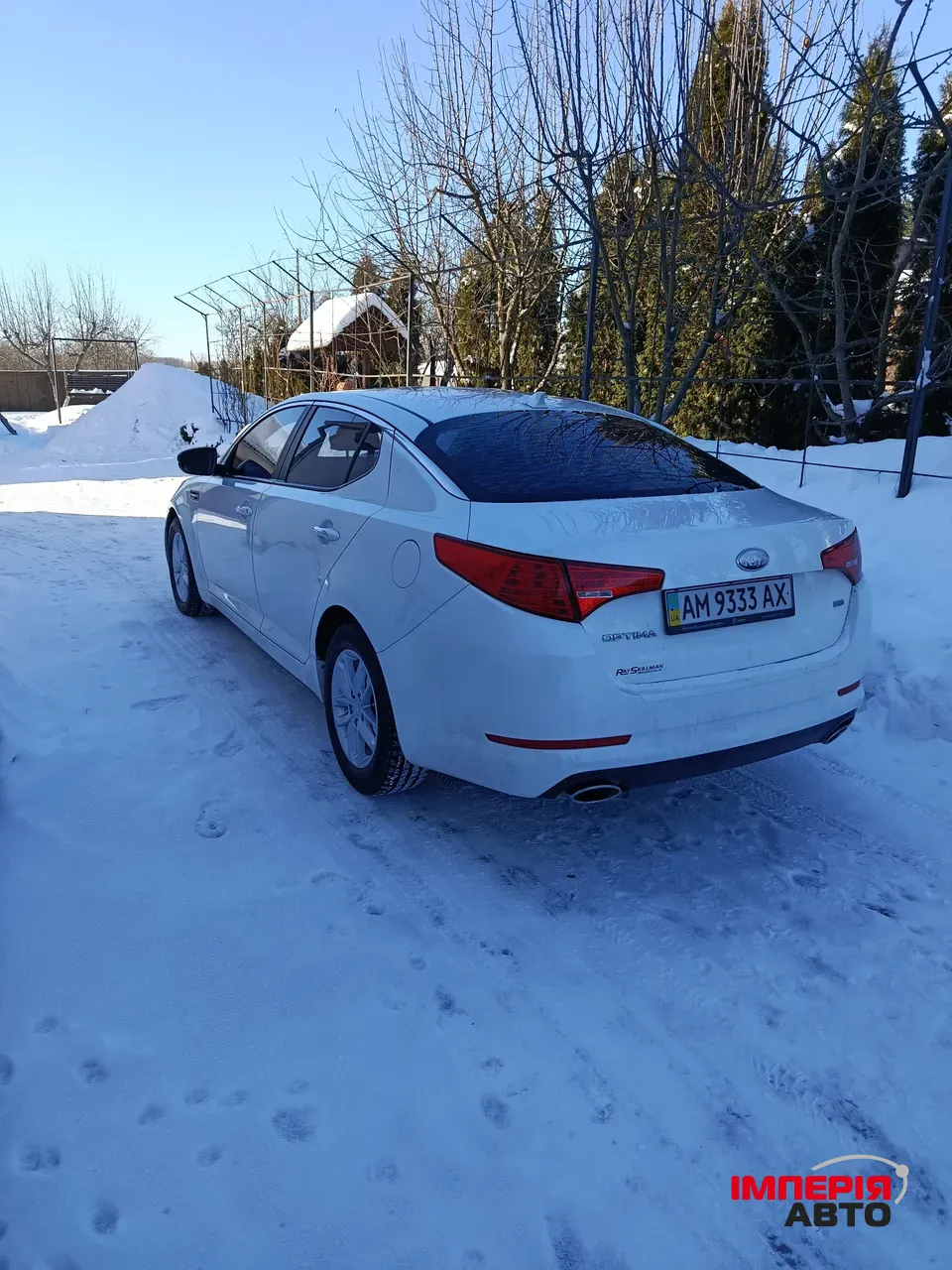 Kia Optima - фото 7