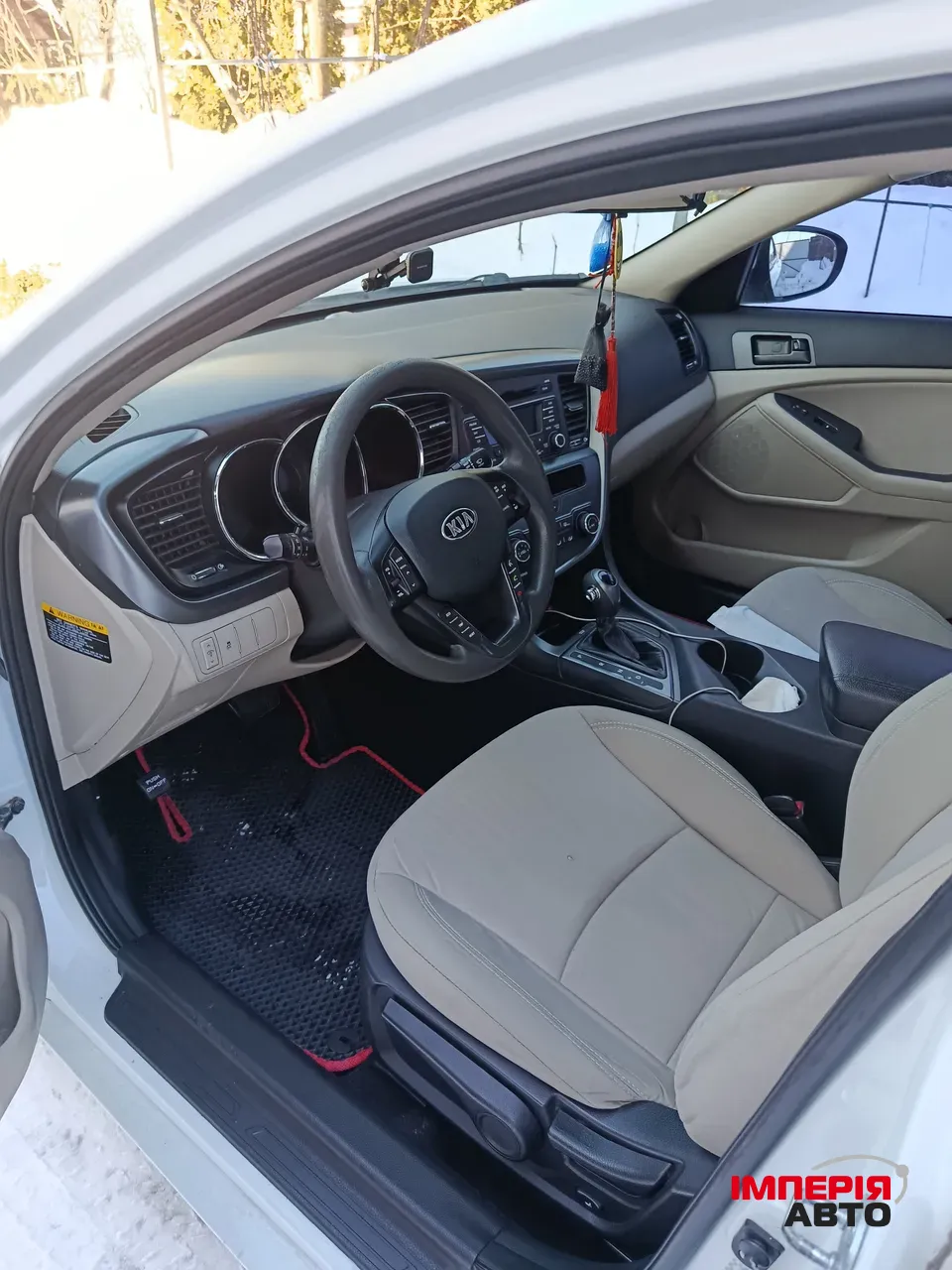 Kia Optima - фото 9