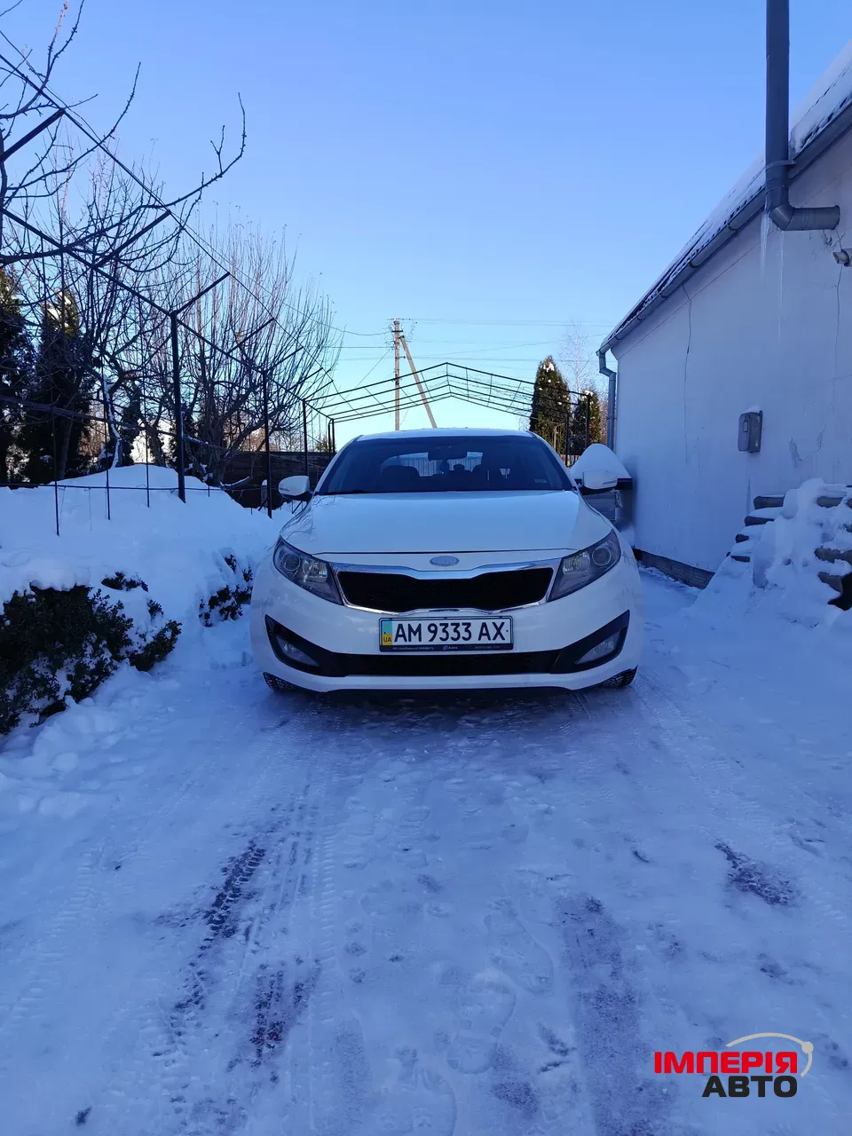 Kia Optima - фото 6