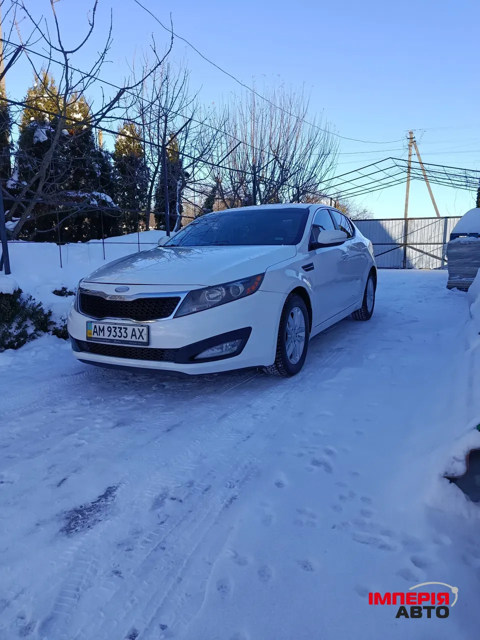 Kia Optima - фото 8