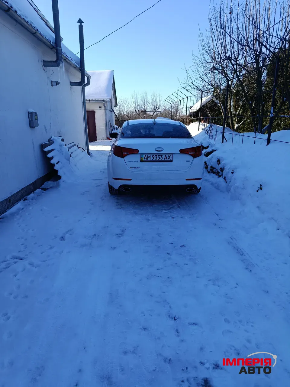 Kia Optima - фото 5