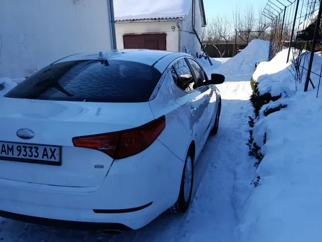 Kia Optima - фото 4