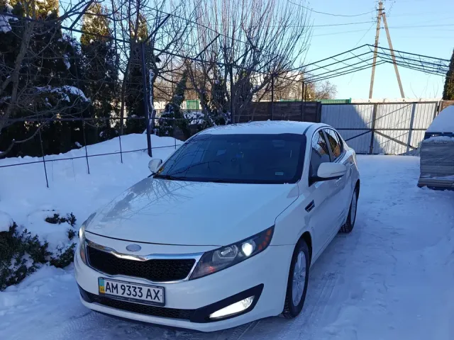 Kia Optima - фото 1