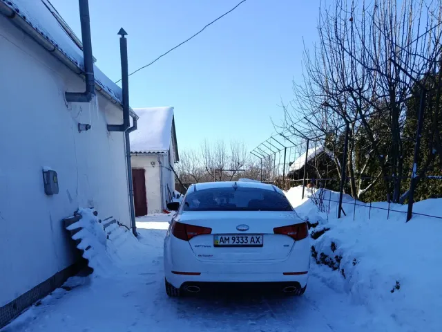 Kia Optima - фото 5