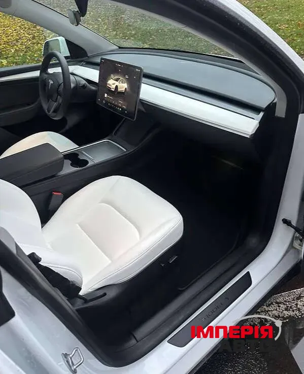Tesla Model Y - фото 9