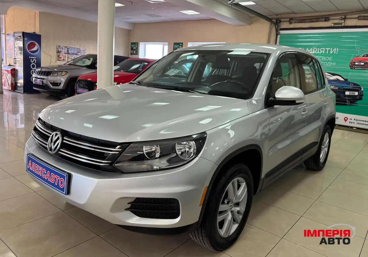 Volkswagen Tiguan - фото 1