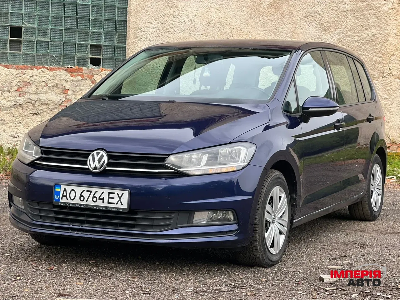 Volkswagen Touran - фото 1