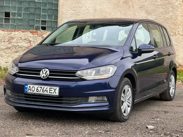 Volkswagen Touran - фото 1