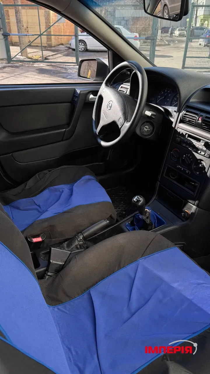 Opel Astra - фото 26