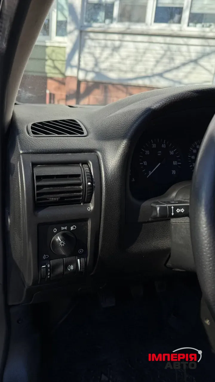 Opel Astra - фото 14