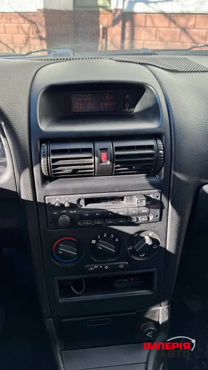 Opel Astra - фото 20