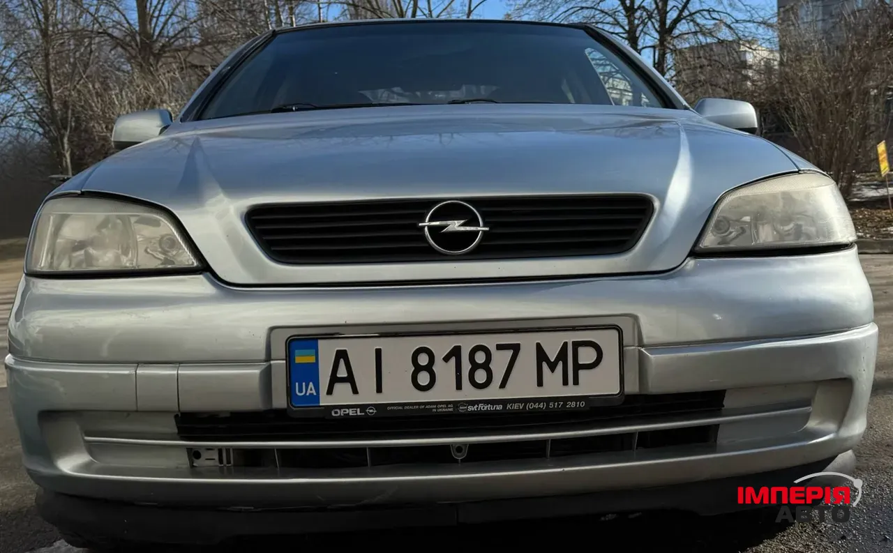 Opel Astra - фото 33