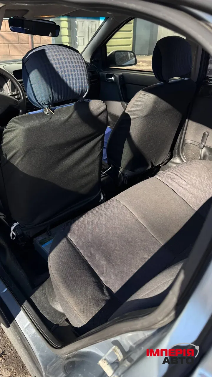 Opel Astra - фото 10