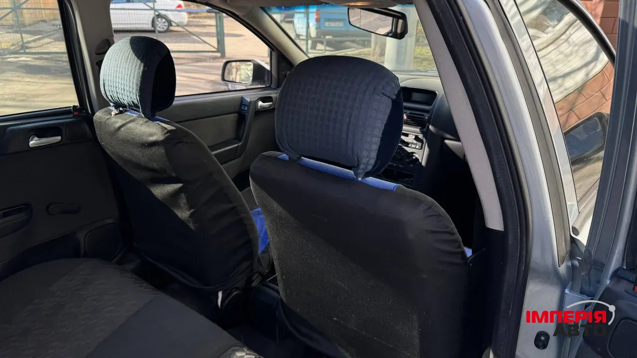 Opel Astra - фото 23