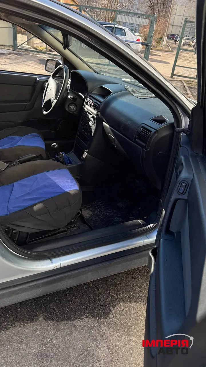 Opel Astra - фото 24