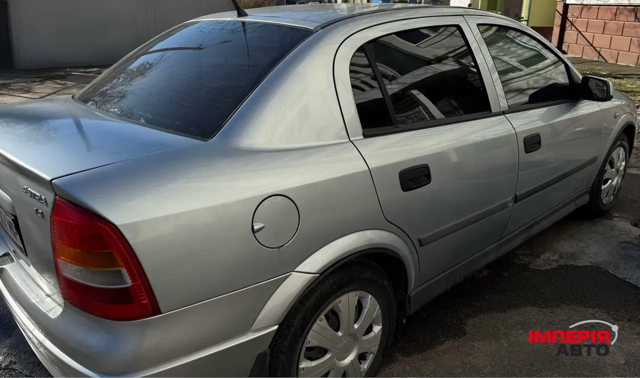 Opel Astra - фото 31
