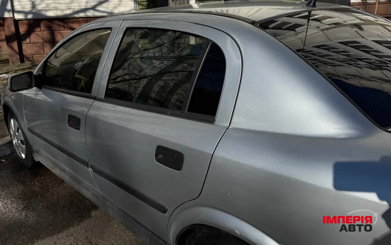 Opel Astra - фото 29