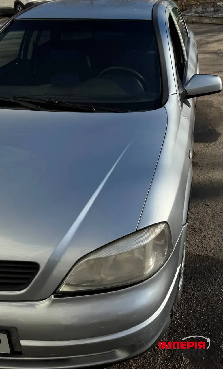 Opel Astra - фото 7