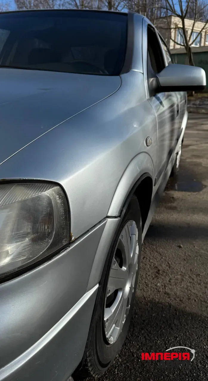 Opel Astra - фото 8
