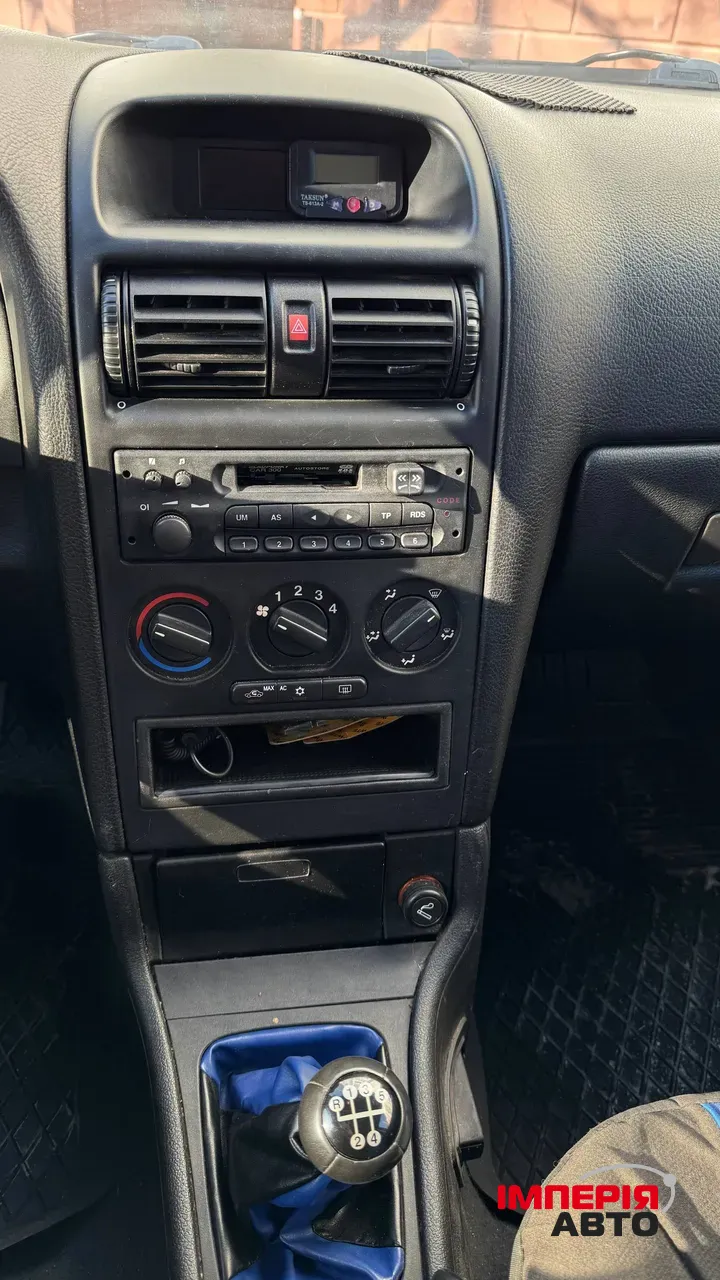 Opel Astra - фото 15