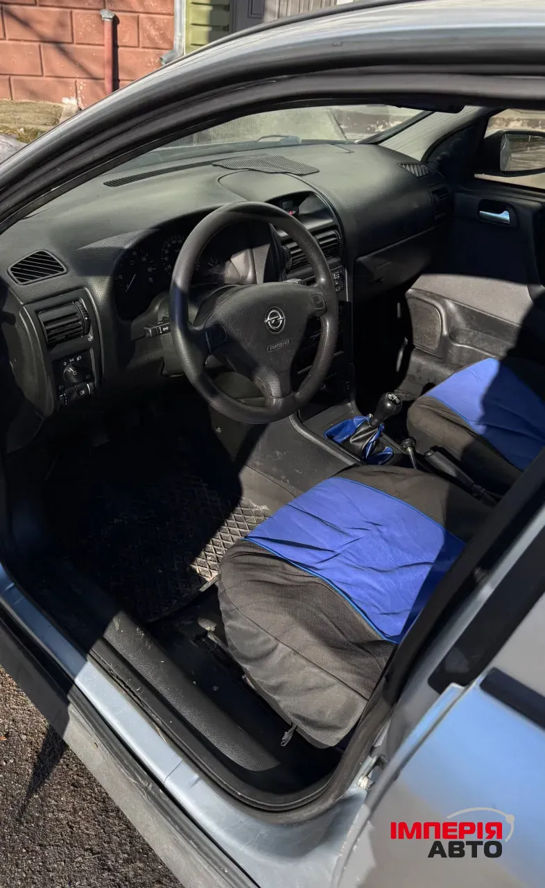 Opel Astra - фото 13