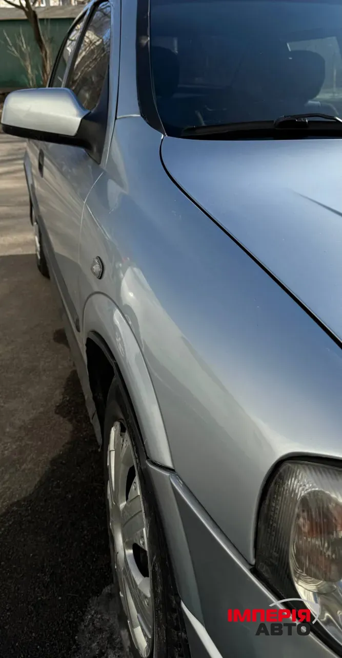 Opel Astra - фото 9