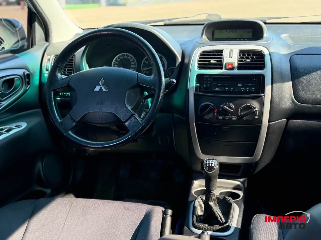 Mitsubishi Space Star - фото 13