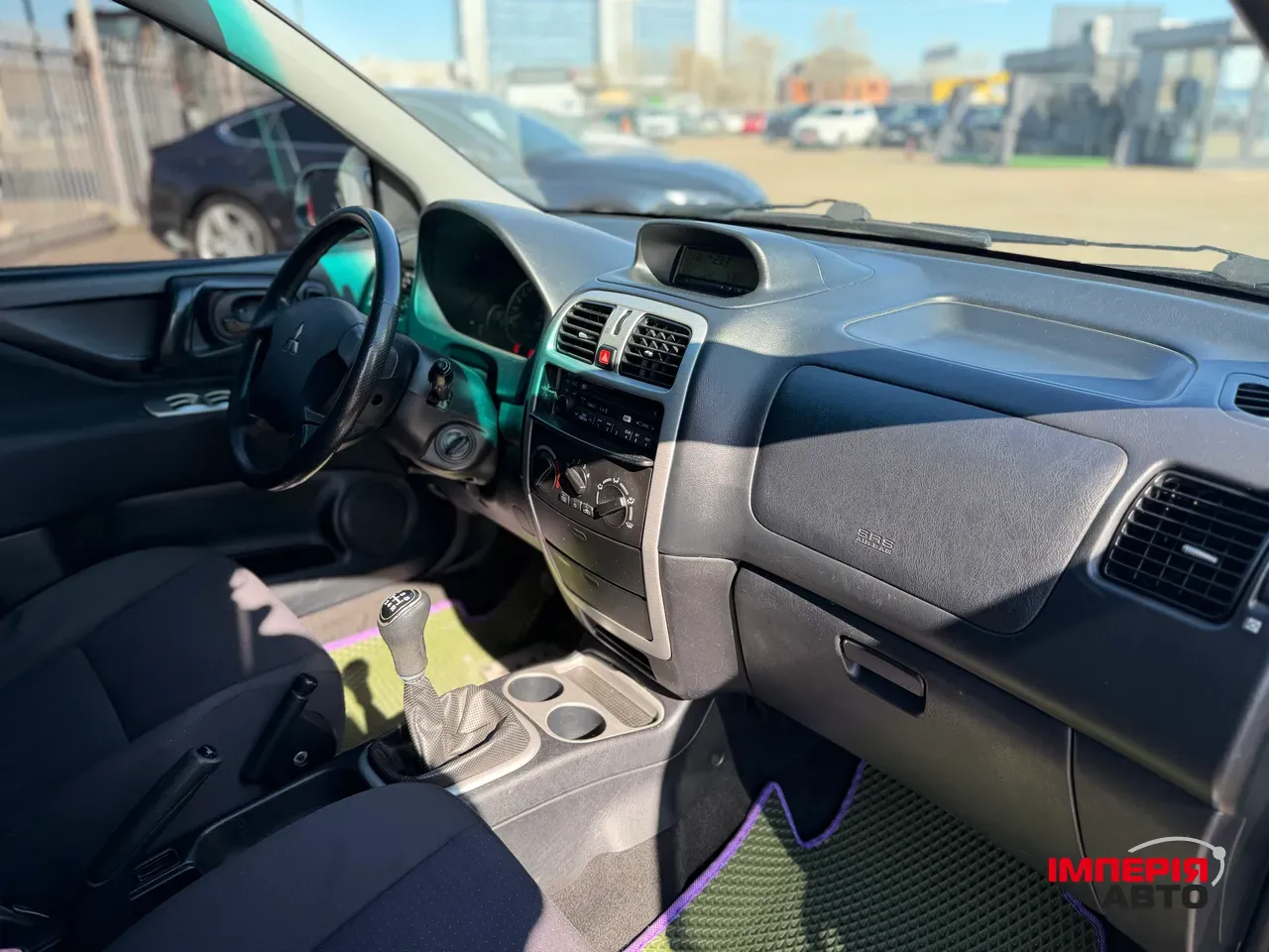 Mitsubishi Space Star - фото 16