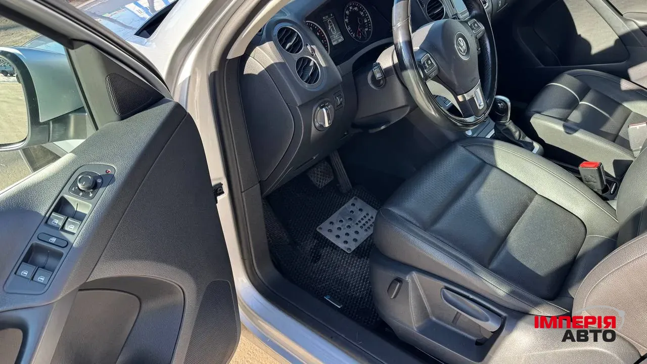 Volkswagen Tiguan - фото 12