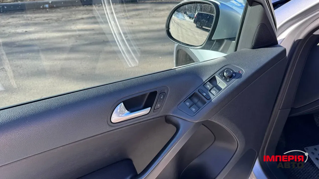 Volkswagen Tiguan - фото 11