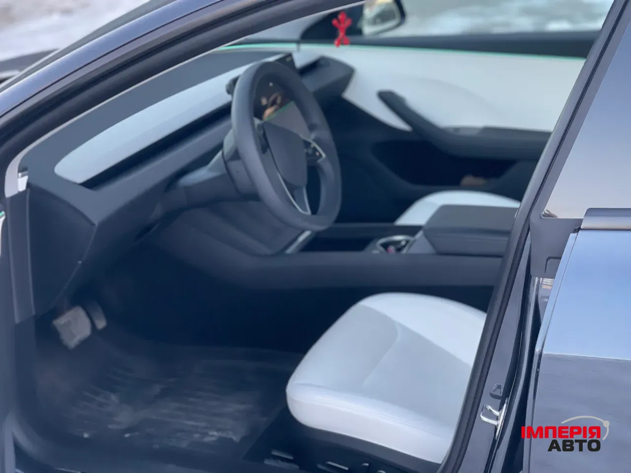 Tesla Model 3 - фото 8