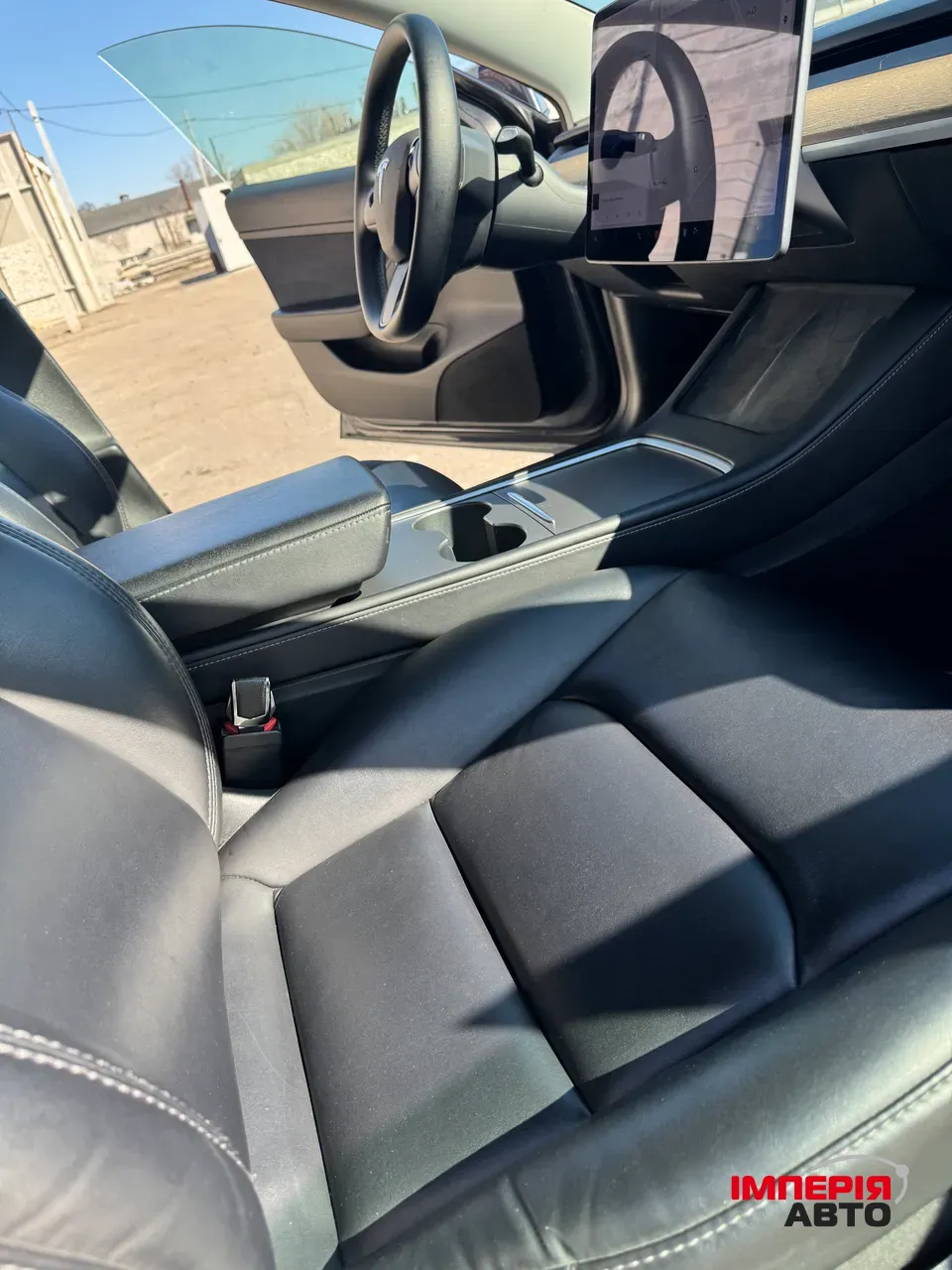 Tesla Model 3 - фото 14