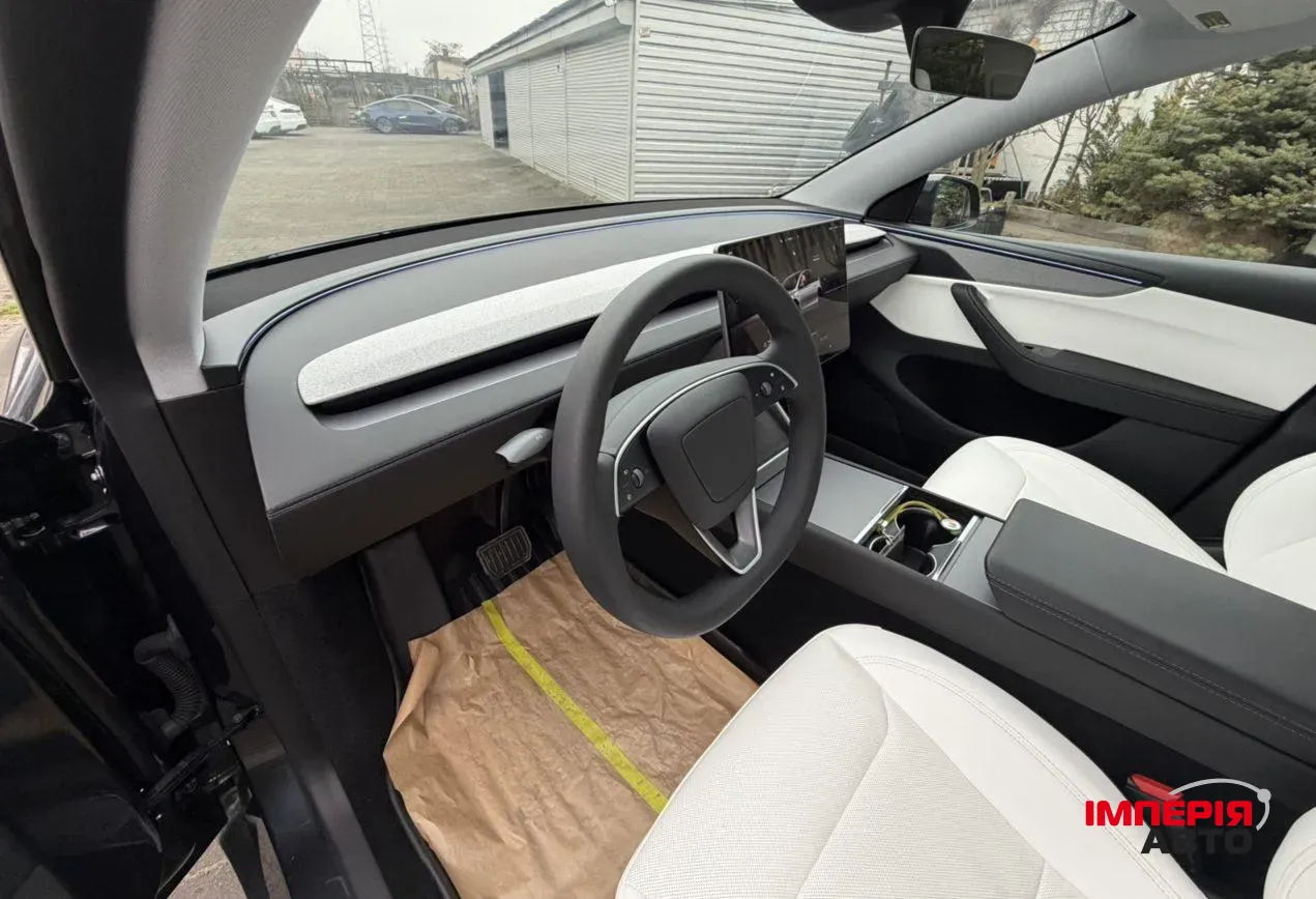 Tesla Model Y - фото 10
