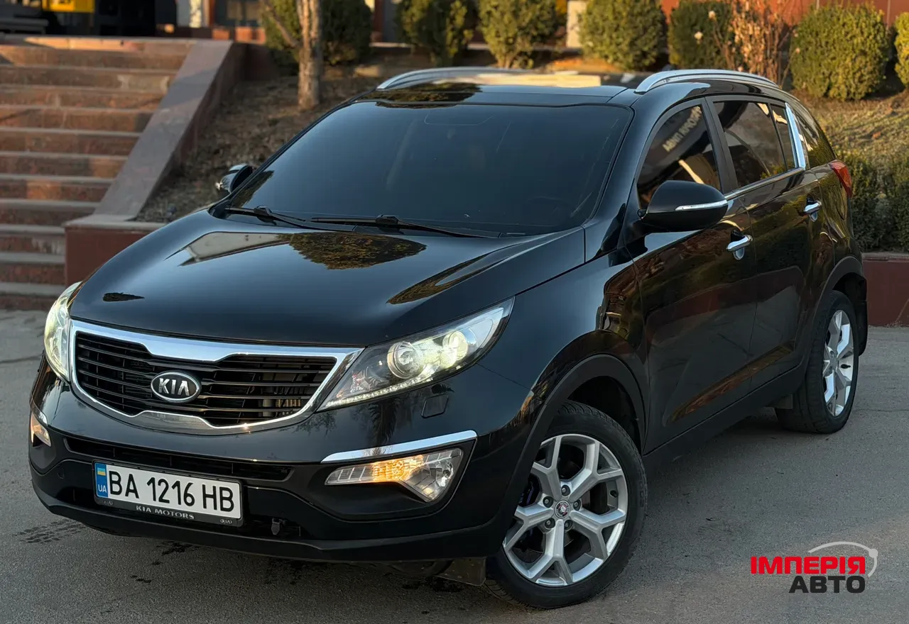 Kia Sportage - фото 1