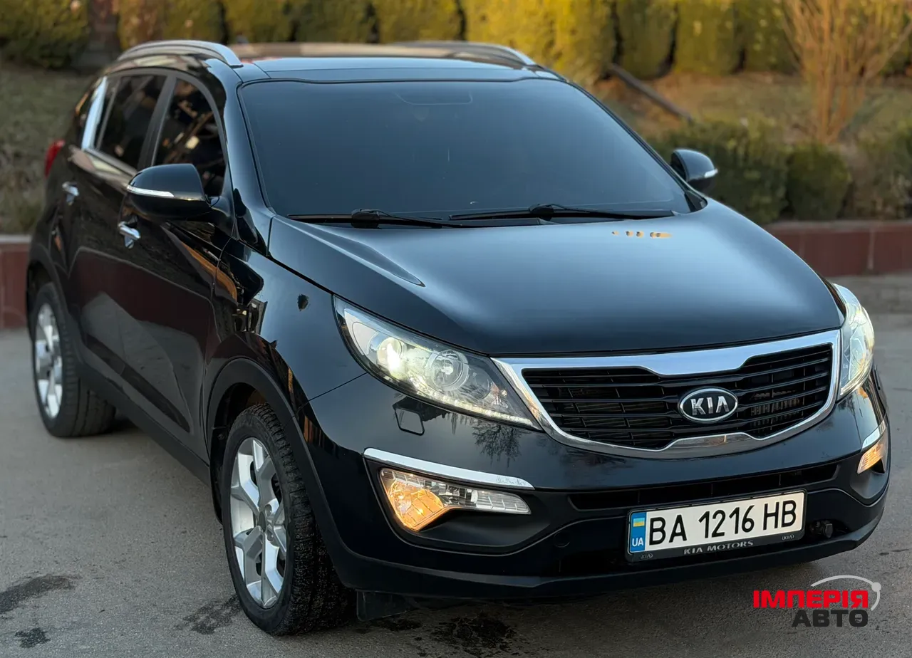 Kia Sportage - фото 12