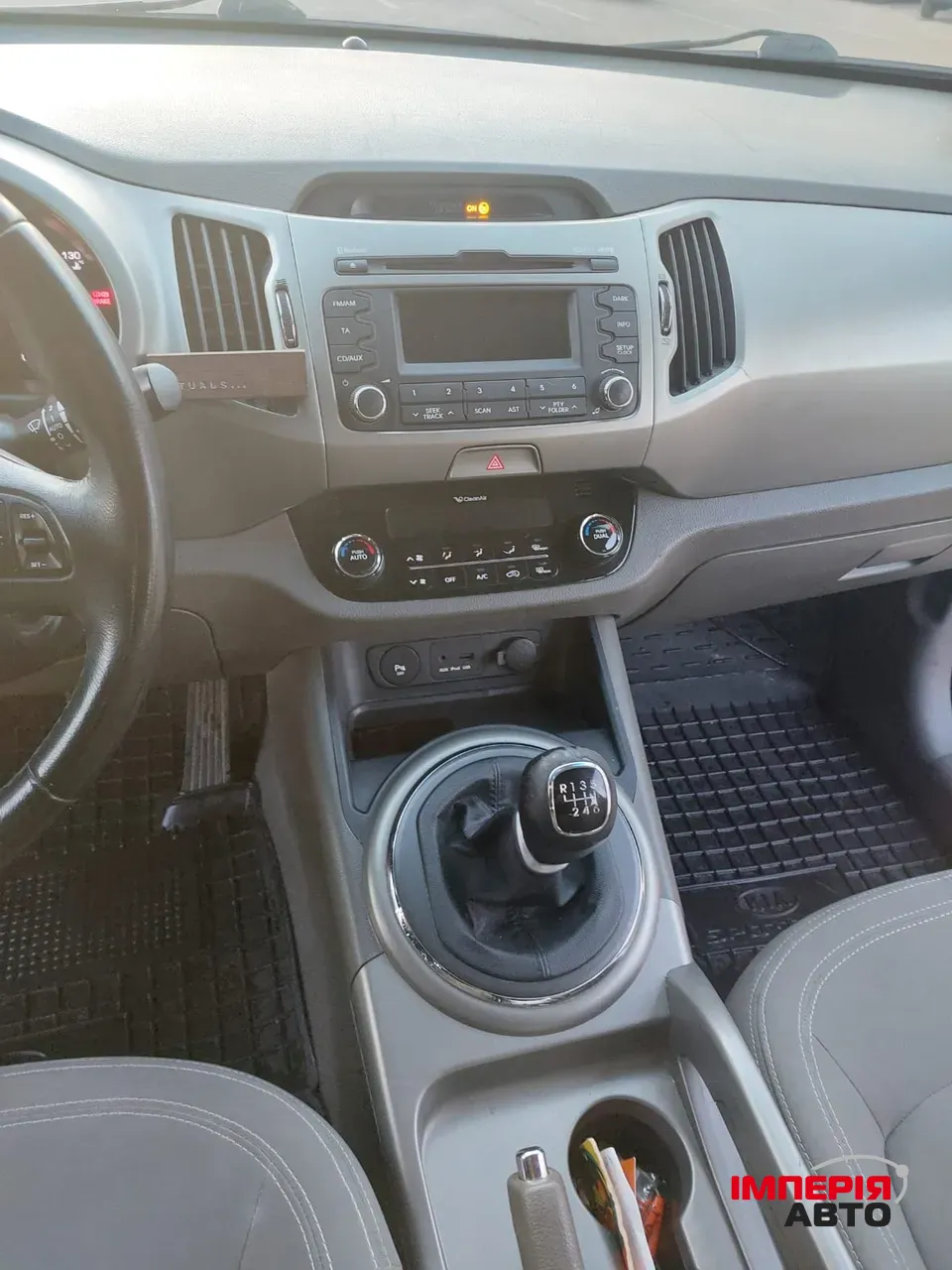 Kia Sportage - фото 12