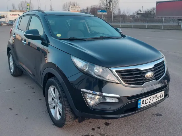 Kia Sportage - фото 1