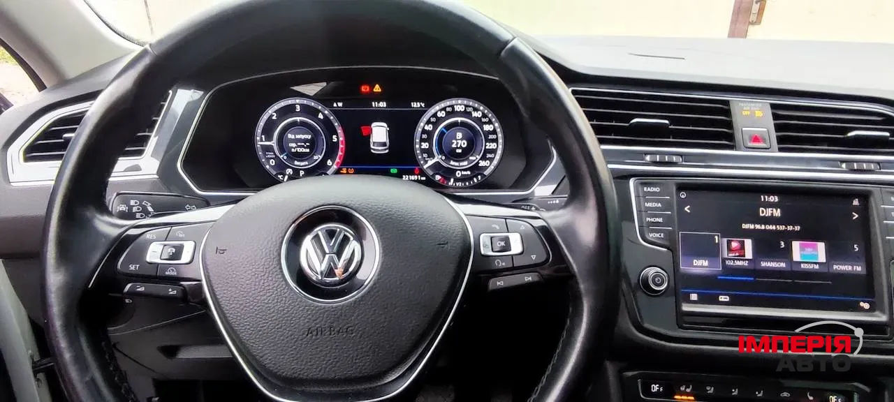 Volkswagen Tiguan - фото 12