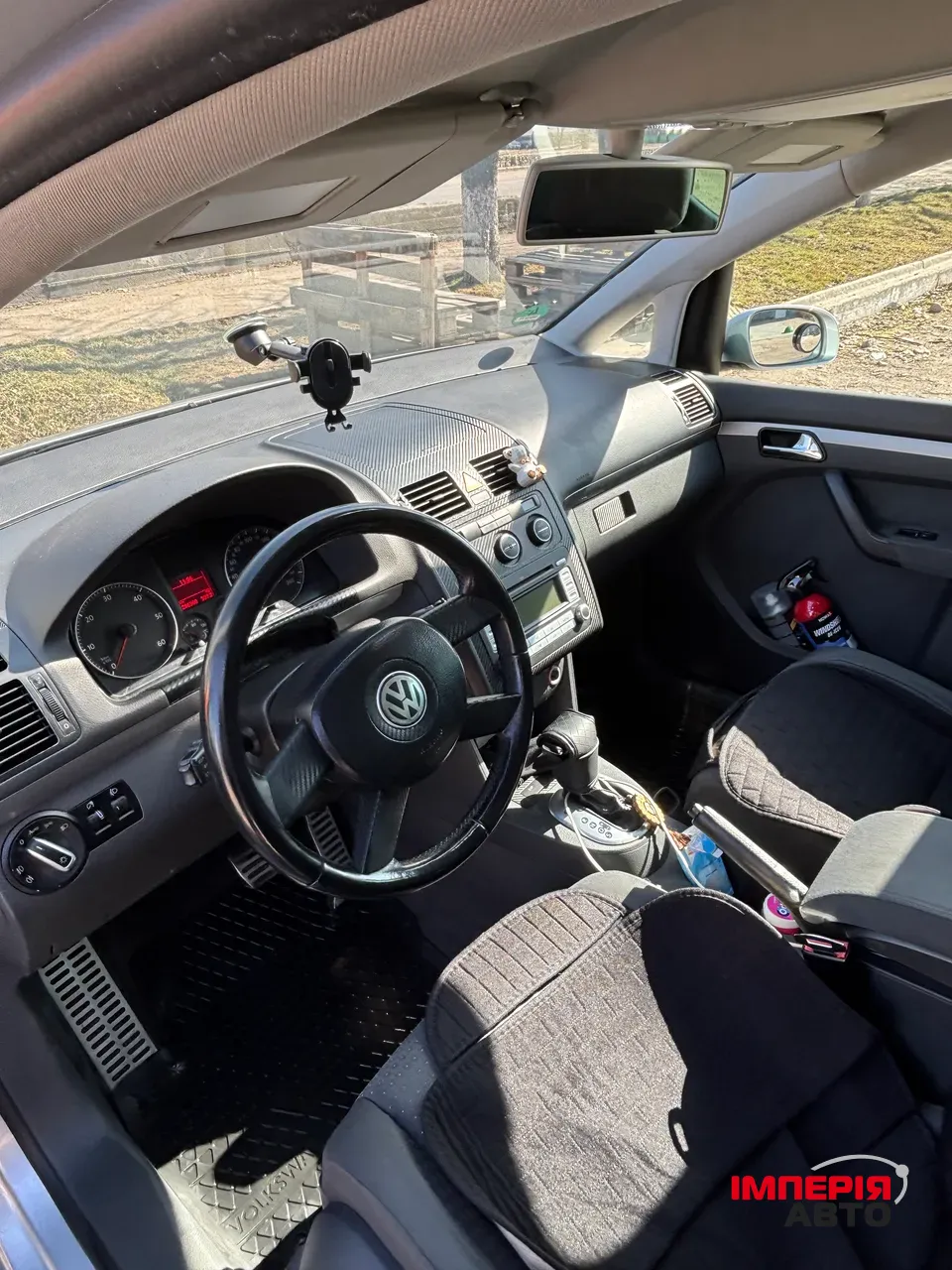 Volkswagen Touran - фото 12