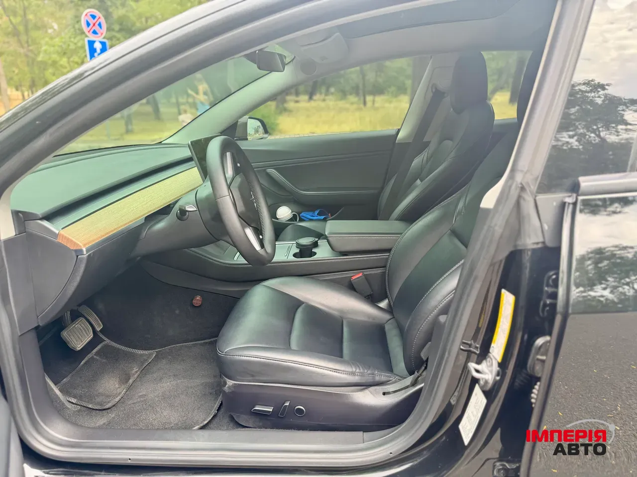 Tesla Model 3 - фото 11