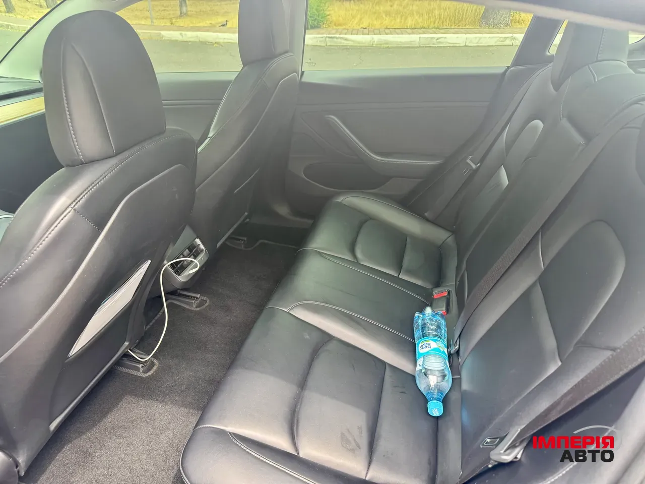 Tesla Model 3 - фото 10