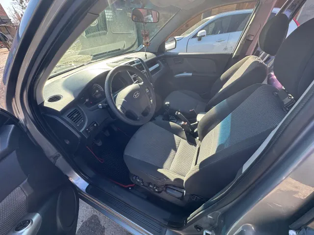 Kia Sportage - фото 5