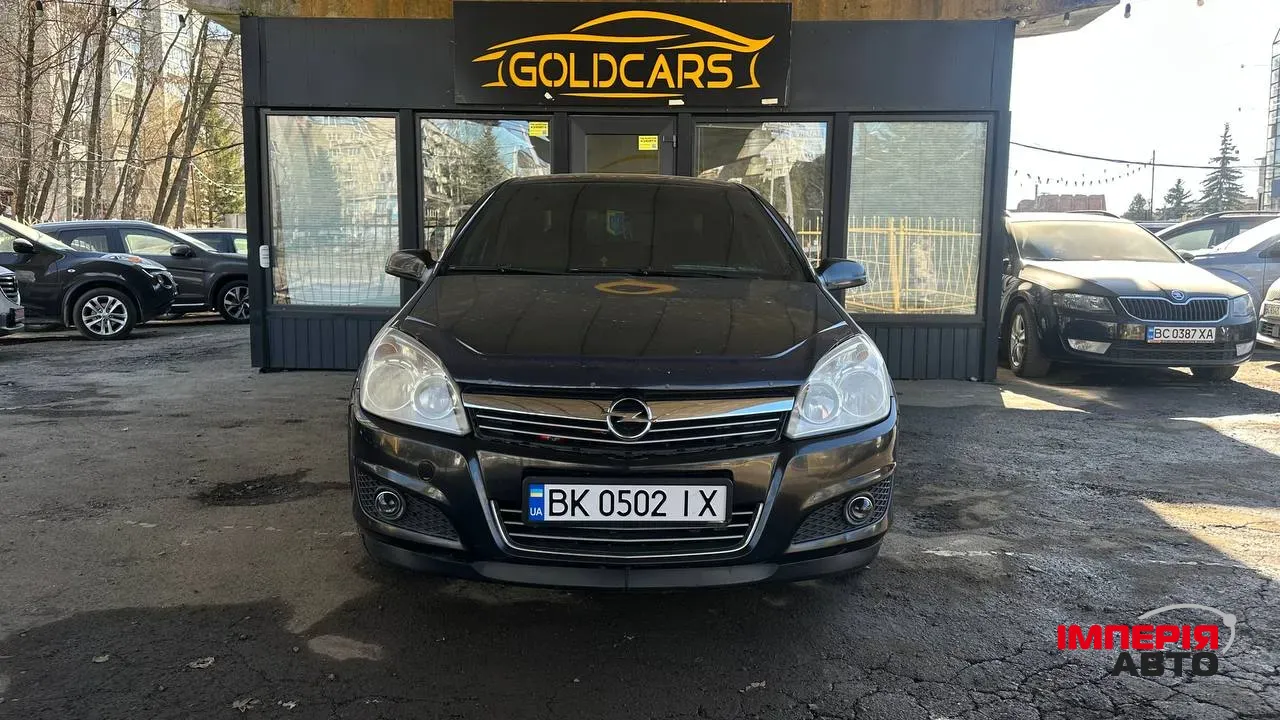 Opel Astra - фото 1