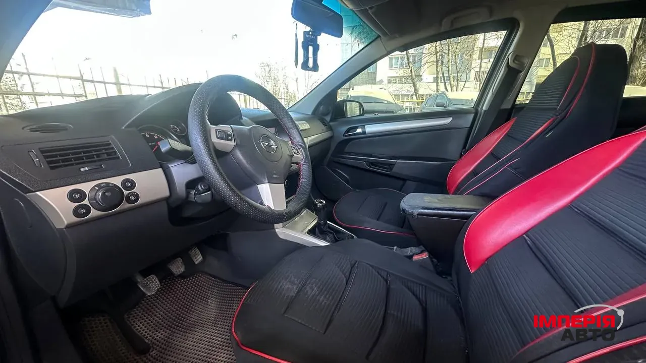Opel Astra - фото 7