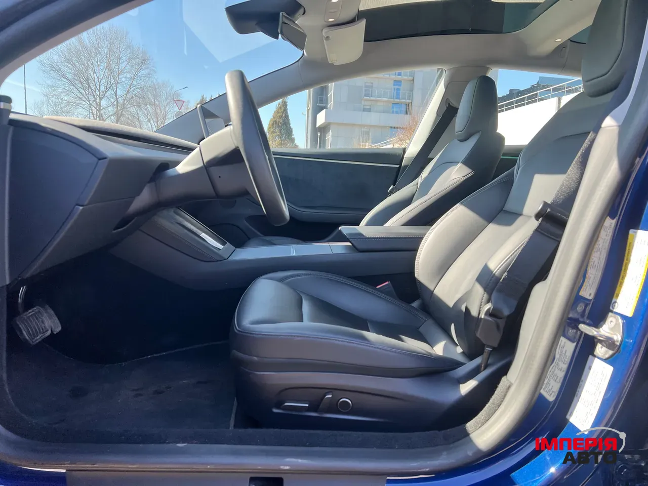 Tesla Model 3 - фото 12